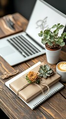 Workspace with gift, laptop, plants, and coffee