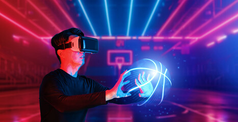 Basketball player bouncing basketball hologram at futuristic sport arena. Energetic athlete or...