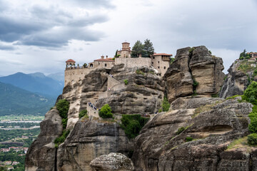 ancient churches in the remote mountains of the Meteora Valley in Greece on a May day