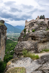 ancient churches in the remote mountains of the Meteora Valley in Greece on a May day