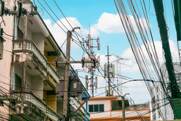 Obraz premium Urban Skyline with Communication Towers