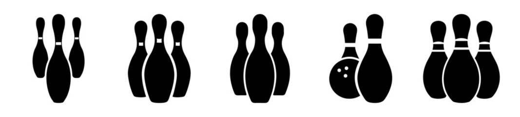 Different arrangements and styles of bowling pins and a bowling ball