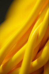 Close-up shot of yellow pasta with texture and details