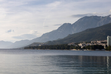 Amazing Makarska beach with boats against adriatic sea in Makarska Riviera, Dalmatia