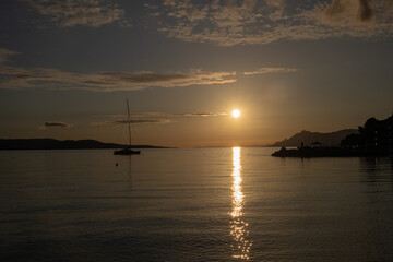 Horizon Sea Sky Background, Sunset sky clouds over sea in the evening with Orange, Yellow sunlight Golden hour in Summer landscape