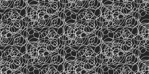 White tangled doodles on black seamless background