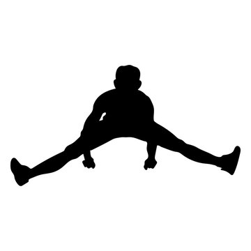 Man doing side split silhouette