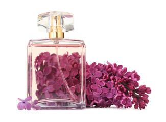 Bottle of luxury perfume and lilac flowers isolated on white