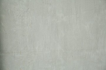 Grey cement textured surface as background, closeup