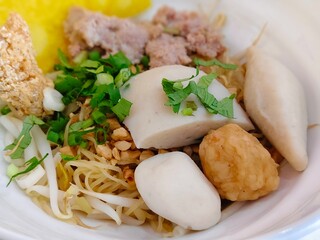 Yellow noodle with fish balls