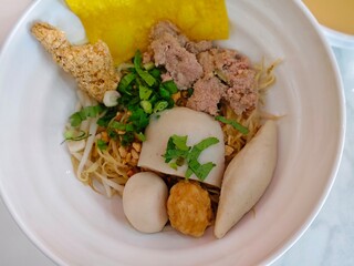 Yellow noodle with fish balls