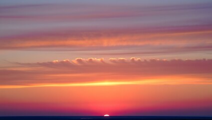 Fototapeta premium Serene Sunset A Captivating Display of Colors in the Sky