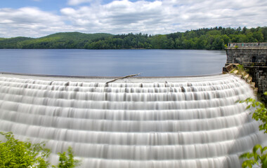 water pouring down the croton dam in westchester new york (natural and man made waterfall river) bridge stone structure park gorge