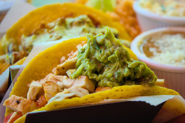 guacamole on corn taco close up chicken mexican food cuisine mexico salsa dish holder tacos lunch...