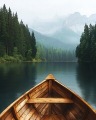 Obraz premium Tranquil Lake Journey: The bow of a wooden boat slices through the still, dark waters of a lake, framed by towering evergreen trees and distant, mist-shrouded mountains.