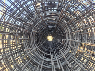 Mesh wire rolls construction material.Net wire mesh roll in construction area.Construction iron wire