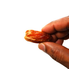holding a date fruit with white background close-up view copy space 