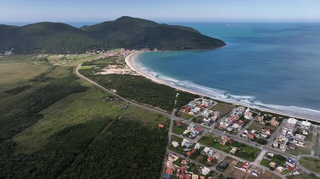 Florianopolis in Santa Catarina during a wonderful sunrise. Pantano do Sul in aerial view.