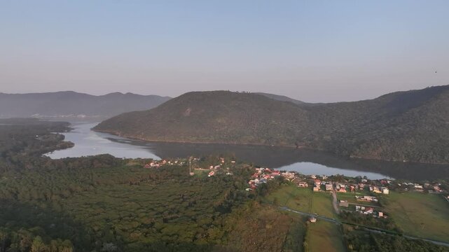 Florianopolis in Santa Catarina during a wonderful sunrise. Mo&ccedil;ambique Beach in aerial view.
