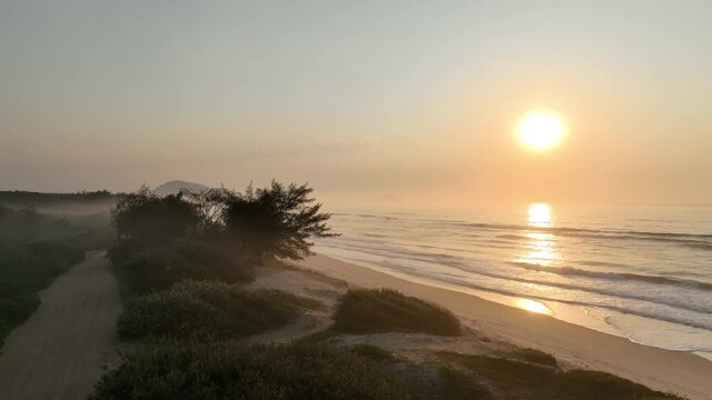 Florianopolis in Santa Catarina during a wonderful sunrise. Mo&ccedil;ambique Beach in aerial view.
