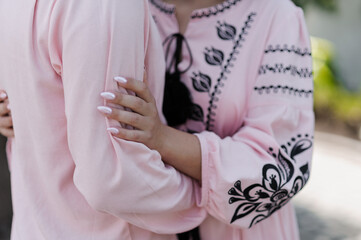 Pink Embroidered Ukrainian Vyshyvanka Blouse Detail with Black Floral Motifs and Long Sleeves