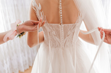 Bridal Moment: Backless Wedding Dress Corset Detail with Veil, Pink Corsage, Elegant Getting Ready...