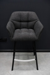 Modern Gray Fabric Armchair on Black Background: Contemporary Minimalist Dining Chair with Metal...