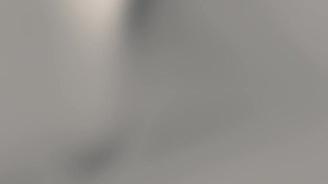 Smooth and elegant silver gradient background in 4K resolution. Features soft metallic tones, luxury minimalist style, and gentle lighting transitions. Perfect for use in product displays.