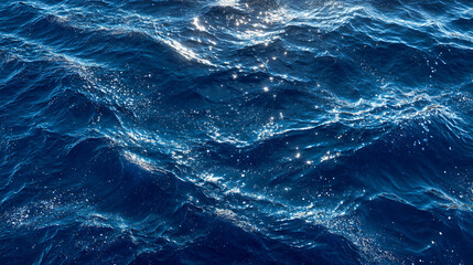 Obraz premium Water Ocean Waves Blue Texture Reflections Nature Motion Marine Surface Clear Elements Background Aquatic Depth Sparkling Liquid Tranquil Shimmering Scenic Droplets Ripples Aerial Vibrant