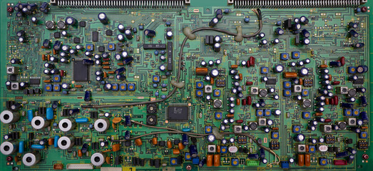 Electronic circuit board showing components and wiring background