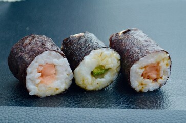 sushi rolls sushi in plastic tray food rolls