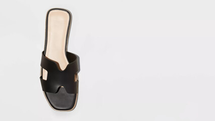 Stylish black slide sandal showcasing modern design and comfort for casual summer wear