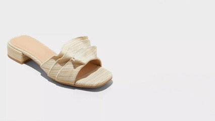 Stylish beige heeled sandal showcasing ruffle design suitable for summer occasions and casual outings