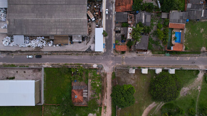 Aerial view of intersection between paved and unpaved streets