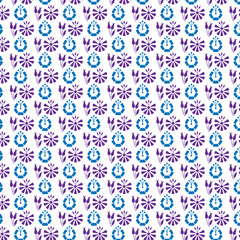 Ornamental floral seamless pattern in blue and purple on a white background suitable for textiles