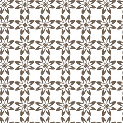 Seamless repeating floral pattern in brown color perfect for textile design and backgrounds.