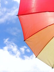colorful umbrellas against blue sky