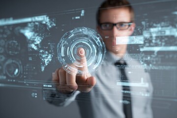 A professional man uses a futuristic touchscreen interface with digital data overlay.
