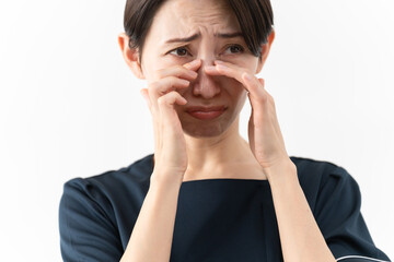 エステサロン制服を着た若い女性　ビューティイメージ
