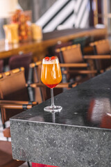 Chilled Orange Beverage in Clear Glass with Fruit Garnish - Fresh Orange-Colored Cocktail with Slice of Orange and Ice.jpg, Chilled Orange Beverage in Clear Glass with Fruit Garnish - Fresh Orange-Col