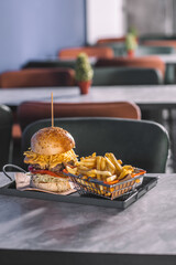 Juicy Big Hamburger with Crispy French Fries and Dipping Sauce - Juicy Big Hamburger with Crispy French Fries and Dipping Sauce