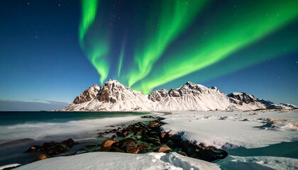 Naklejka premium Aurora Borealis over Snowy Mountains and Frozen Ocean