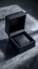 Fototapeta premium Elegant Black Luxury Jewelry Gift Box Mockup With Open Lid On Dark Stone Surface Perfect For Branding Packaging And Product Display