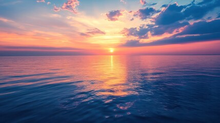 Enchanting twilight seascape displaying a radiant pastel hued sky reflecting on serene waters