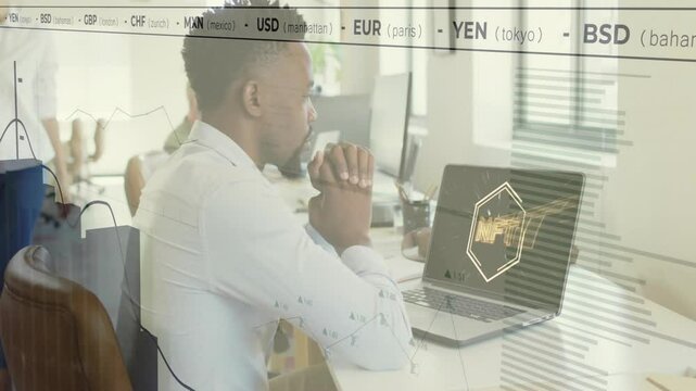 Office worker tracking NFT data as updates animating bar charts, line graphs for finance