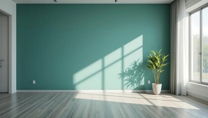 Sunlit teal room with plant, offering tranquil and modern design concept