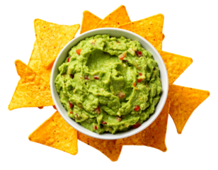 Overhead view of fresh guacamole in white bowl and golden tortilla chips. Delicious food appetizer with transparent background
