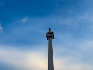 Monas (national monument), one of the icons of pride for Jakarta residents with blue sky background