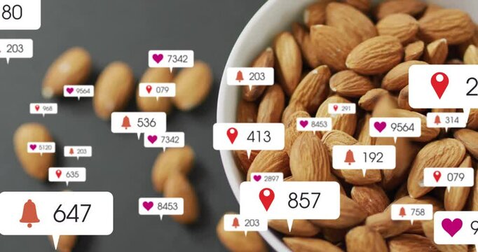 Location-pin popping over almond, icons growing then fading over nut bowl showing engagement