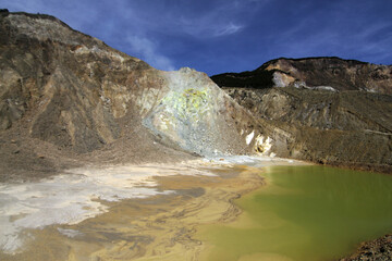 scenery volcano papandayan mountain with summer blue sky at Garut West Java Indonesia 